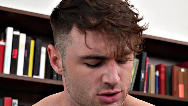 Mesmerized jock fucked in office by dominant colleague