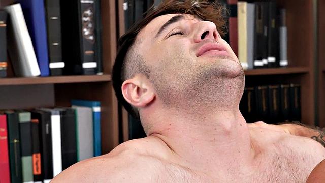 Mesmerized jock fucked in office by dominant colleague
