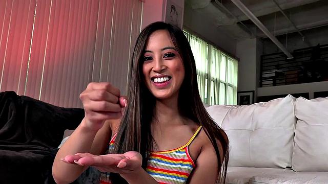 Sweet asian amateur spoils guy with HJ as she rubs her pussy