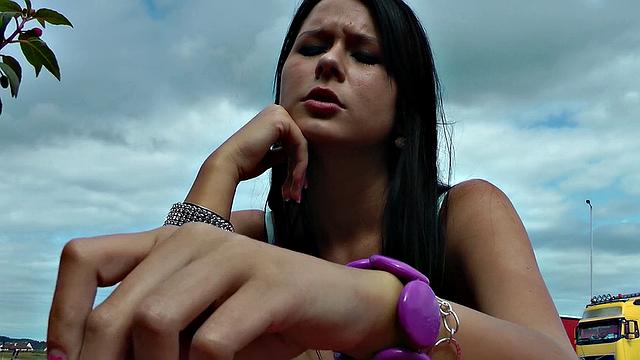 A tattooed brunette get her bald pussy fingered and fucked in a taxi ride