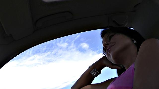 A tattooed brunette get her bald pussy fingered and fucked in a taxi ride