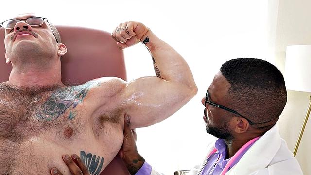 Muscle Black doctor jerks cock of muscled hunk