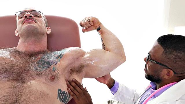 Muscle Black doctor jerks cock of muscled hunk
