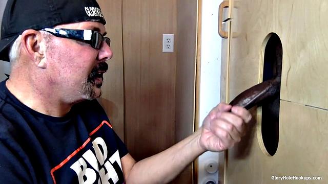 Ebony Babe Sucks and Swallows at the Gloryhole
