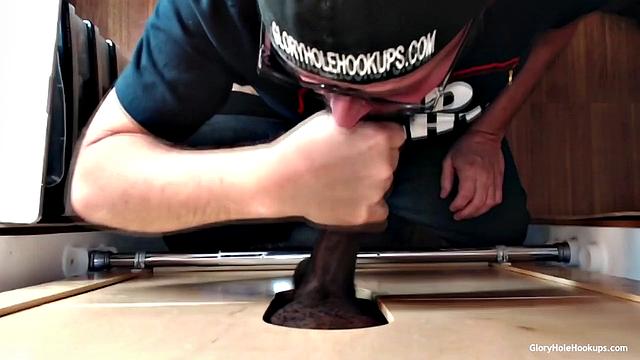 Ebony Babe Sucks and Swallows at the Gloryhole