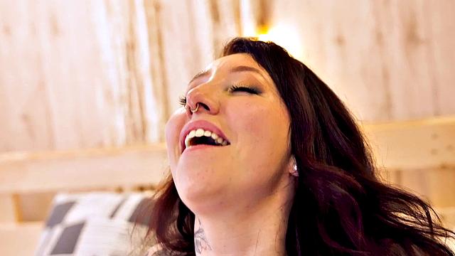 Sensual tattooed babe in lingerie makes love