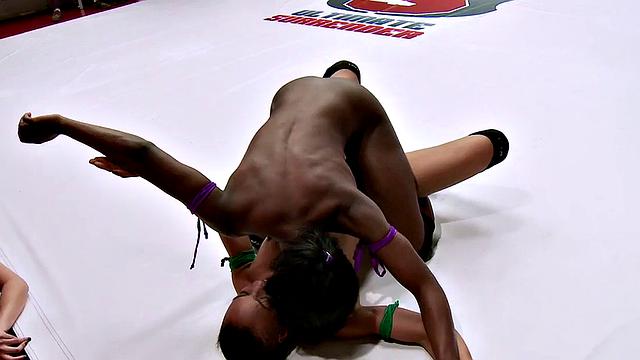 Lez wrestlers fingering in public fight on mat