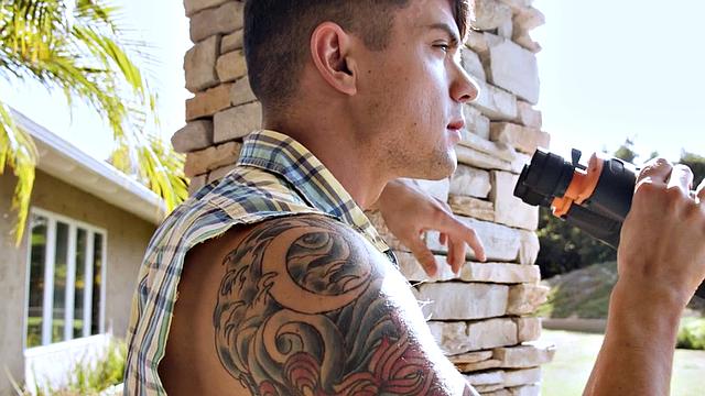 Tattooed stud barebacks bottom until spraying jizz