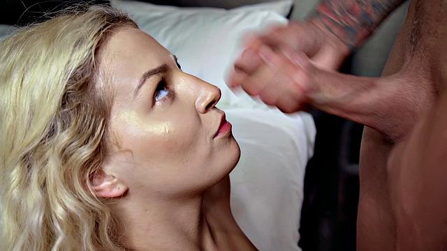 A muscular escort give a hot doggystyle handjob and cumshot in lingerie in the bedroom