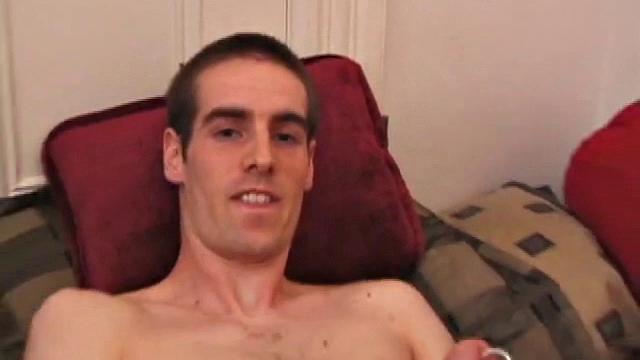 There's some good porn playing on the TV, so James Shafer decides to jack off. He pulls out his pierced dick and strokes it with determination, until he blows his warm cum load.