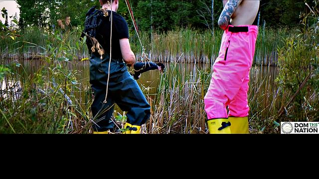 Lezdom babe in anal domination by a quiet serene river