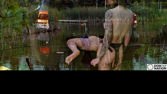 Lezdom babe in anal domination by a quiet serene river