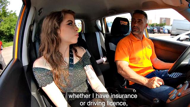 Inked driving student gives head