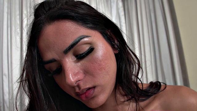 Curly-haired busty babe in high heels jerks off dildo while tugging on her lingerie