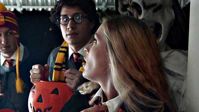 Blonde and brunette MILFs use Magic Wand to scissor, lick and fishnet in hot halloween action