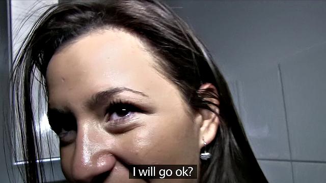 Cash-hungry brunette gives head in public restroom for cash