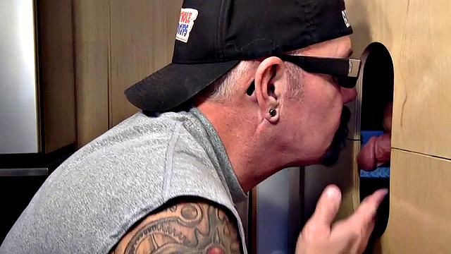 Gloryhole mature gay sucks cock in closeup