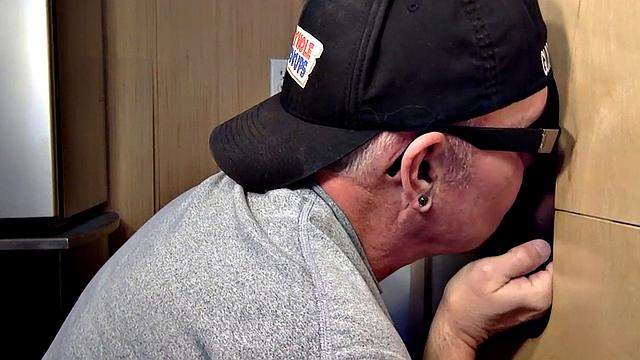 Gloryhole mature gay sucks cock in closeup