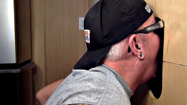 Gloryhole mature gay sucks cock in closeup