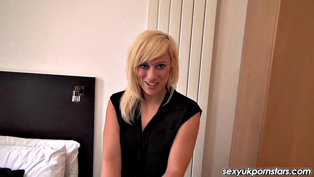 Stocking clad British pornstar Axa Jay promises to suck photographer's cock