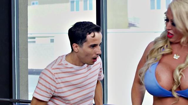 Curvy blonde MILF with massive boobs gives a sloppy gym handjob and rides short guy in reverse cowgirl position