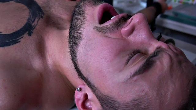 Bondage stud barebacked by muscled top after BJ cumshot