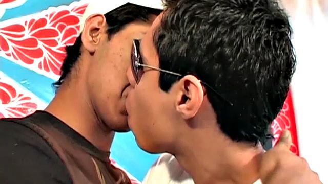 We look in on two Latin twinks with their pants down and cocks out; they kiss passionately, strip, have a hot oral exchange, and end up fucking.