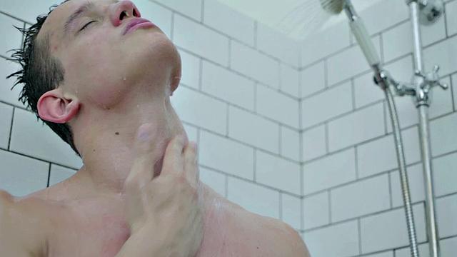 Muscle jock wanking hard cock solo in bathroom