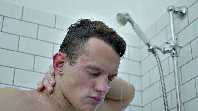 Muscle jock wanking hard cock solo in bathroom