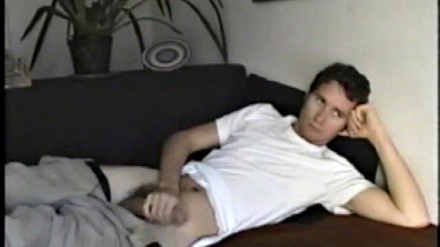 Logan gets on knees, pulls shirt up, yanks on cock. Then slips off boxers, thrusts butt in the air.