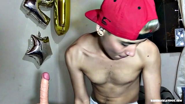 Our featured solo of the week is cute little Zalar, and this time he has a dildo to suck on. The boy teases us in his see through underwear, before finally pushing them down to show off his goods.