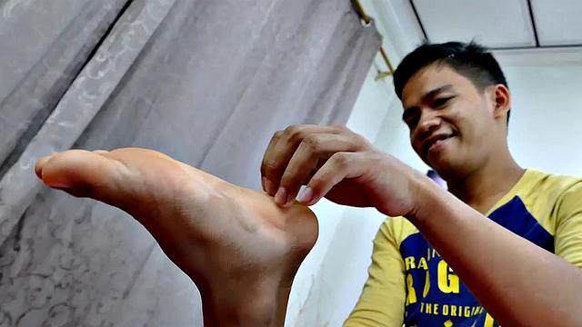 Gay Asian twinks like to get kinky with gay foot fetish sex. They have decided to get extra kinky and tickle each other's feet. But now Marcon wants to taste those Asian twink feet.