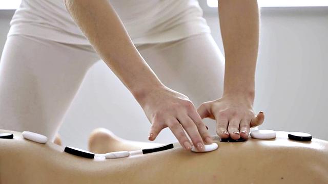 Busty WAM with tattoos assfingered on erotic massage