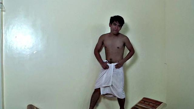 Gay Asian stud Ricky brings home a cute Pinoy go go boy from the gay night club. This handsome Asian boy stands on a bench to sho off his sexy twink body to get Ricky horny for a bareback good time.