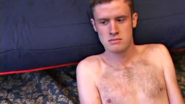 Nate Ritchie strokes his cock to full mast, his eyes glued to the porn video playing. He strokes lying down, standing up, before deciding the best way to unload is upside down.