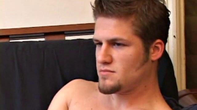 Straight Alex West is turned on by the porn that's playing and quickly gets a stiff one. As he strokes his cock, Alex stuffs his butt with a dildo and busts a load onto his belly.