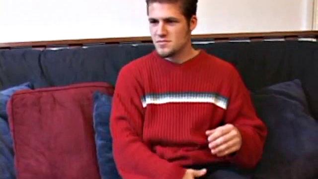 Straight Alex West is turned on by the porn that's playing and quickly gets a stiff one. As he strokes his cock, Alex stuffs his butt with a dildo and busts a load onto his belly.