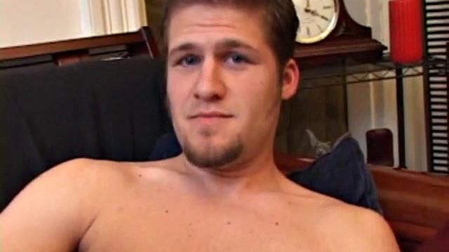 Straight Alex West is turned on by the porn that's playing and quickly gets a stiff one. As he strokes his cock, Alex stuffs his butt with a dildo and busts a load onto his belly.