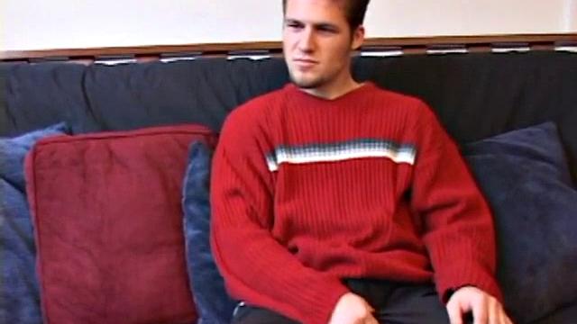 Straight Alex West is turned on by the porn that's playing and quickly gets a stiff one. As he strokes his cock, Alex stuffs his butt with a dildo and busts a load onto his belly.