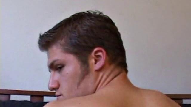 Straight Alex West is turned on by the porn that's playing and quickly gets a stiff one. As he strokes his cock, Alex stuffs his butt with a dildo and busts a load onto his belly.