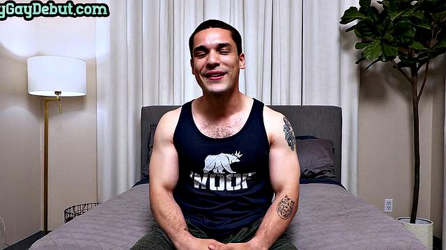 Solo tattooed stud jerks his hard cock for gay porn