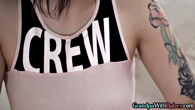 Big-titted inked babe bouncing on DILF