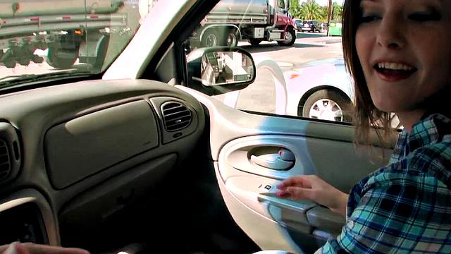 Watch this horny chick give a sloppy car blowjob and handjob in a car