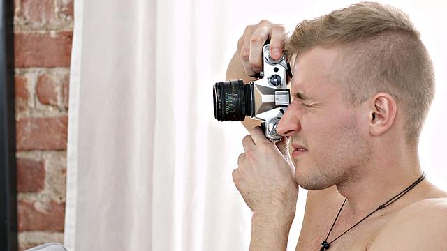 Strawberry blonde banged during a photo session