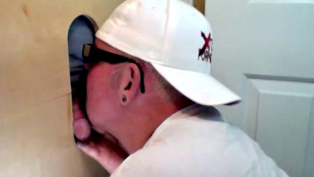 guy tries a gloryhole blowjob with another man