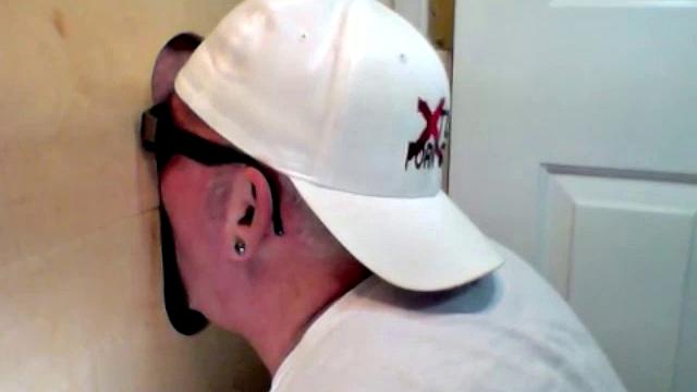 guy tries a gloryhole blowjob with another man