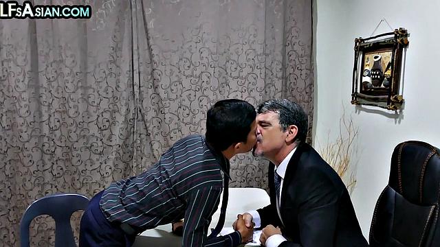 Office Asian twink enjoys anal with white businessman