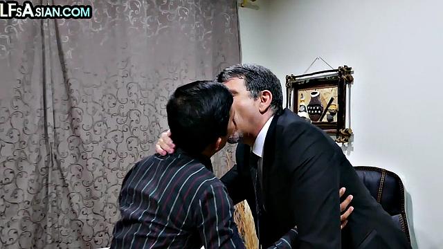 Office Asian twink enjoys anal with white businessman