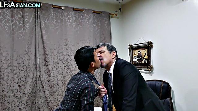 Office Asian twink enjoys anal with white businessman