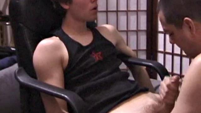 A shaved head and a naughty but nice looks belong to Kenny. Already shirtless, he pulls his pants and boxers down around his ankles and gets to work on his thick cock.